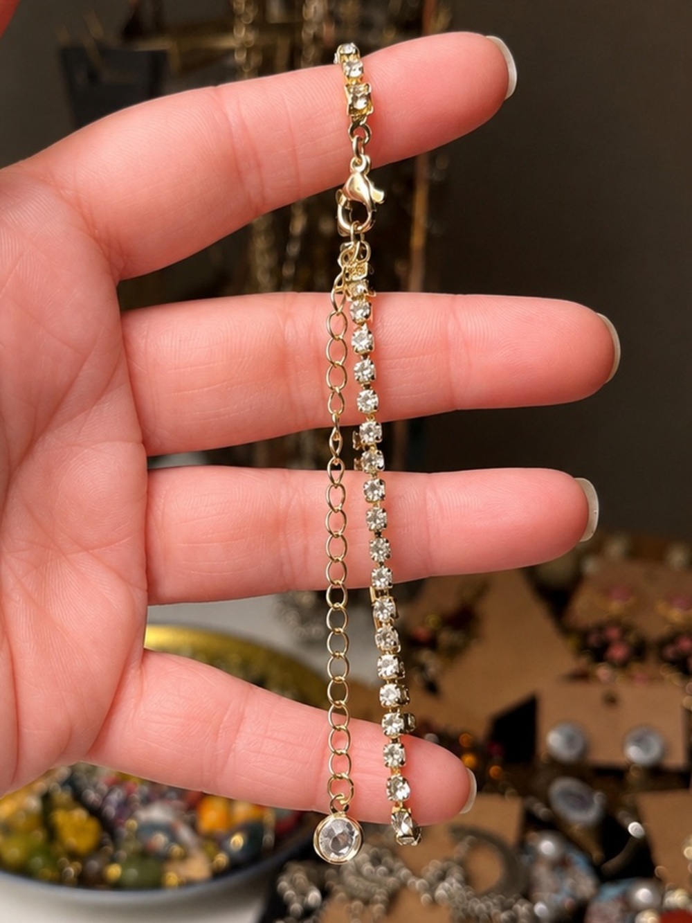 Gold Tone Rhinestone Tennis Bracelet with Crystal Charm